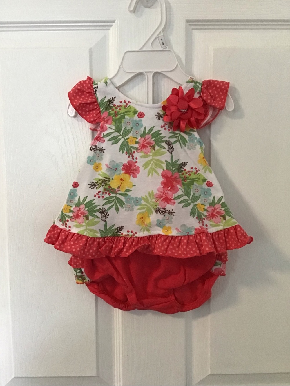 NWOT!  Floral Coral Ruffle Baby Romper with Flower Accent